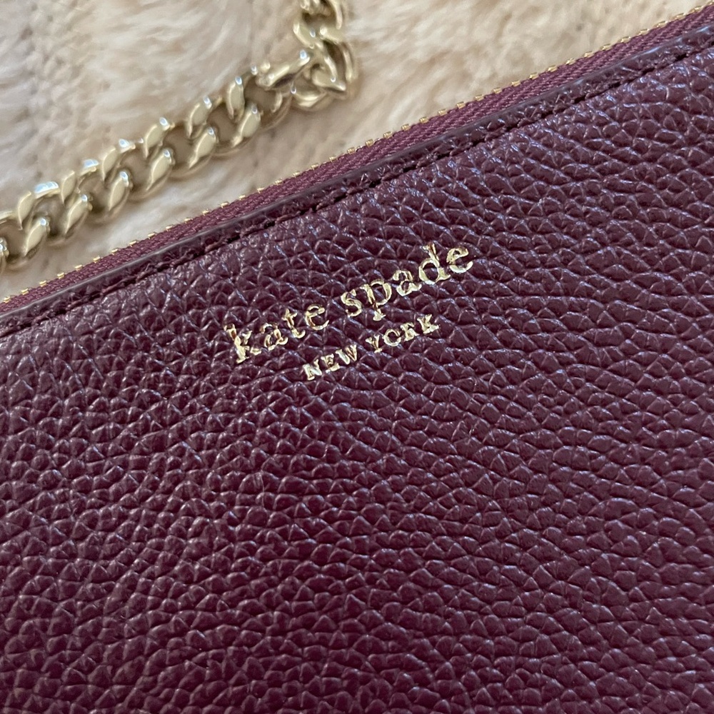 KATE SPADE wallet sized crossbody style.